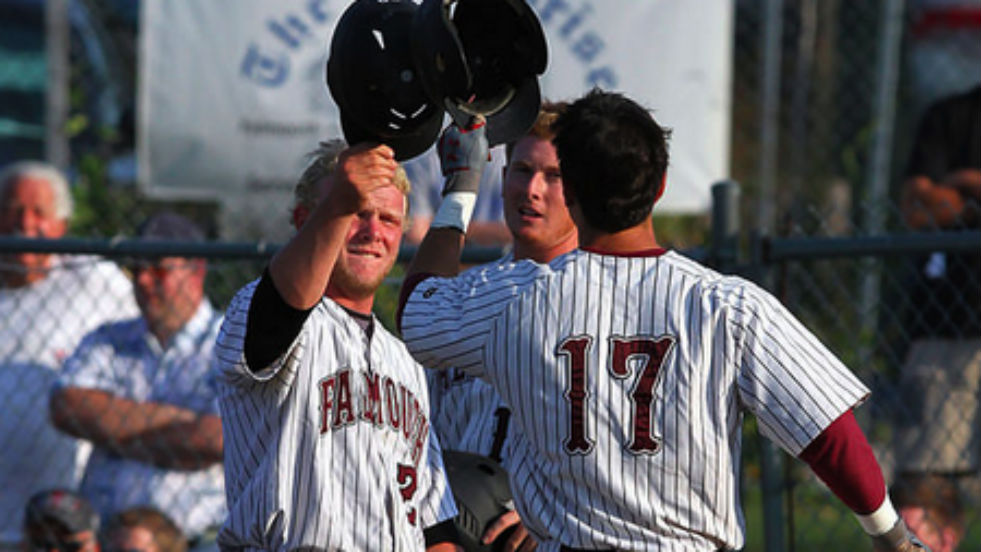 Falmouth players celebrate during their series with Cotuit.